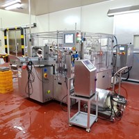 Máy chiết rót và đóng túi dạng quay tự động gắp 1 lần 2 túi