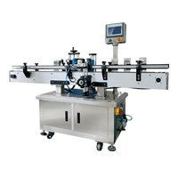 Máy dán nhãn chai tròn tự động (dán định vị) Kolner