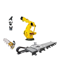 Dây chuyền chế biến thực phẩm Robot với giác hút chân không để gắp và xếp chồng thùng carton FANUC M-2000IA/900L