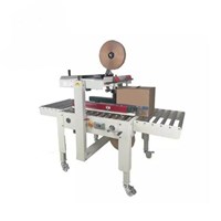 Máy dán băng keo thùng FXJ5050