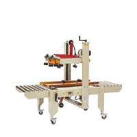 Máy dán băng keo thùng carton bán tự động YUPA-6050