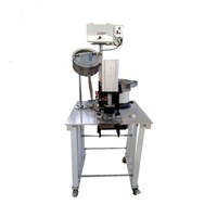 Máy dập khuy bạt viền đen tự động