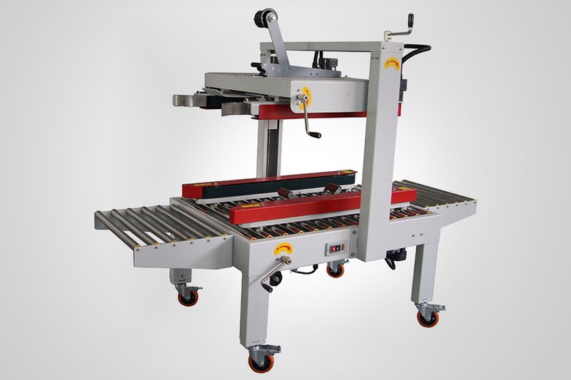 Máy dán thùng carton bán tự động EXC - 307S